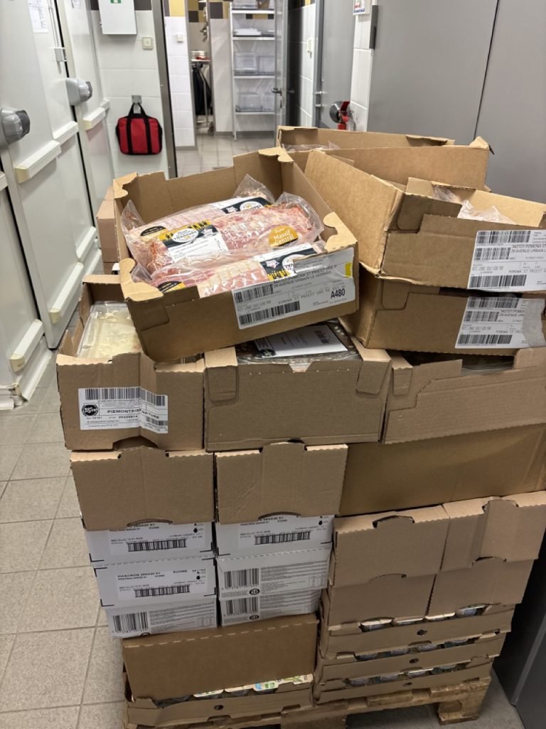 Large delivery of fresh products including pork filet mignon for French school lunch.