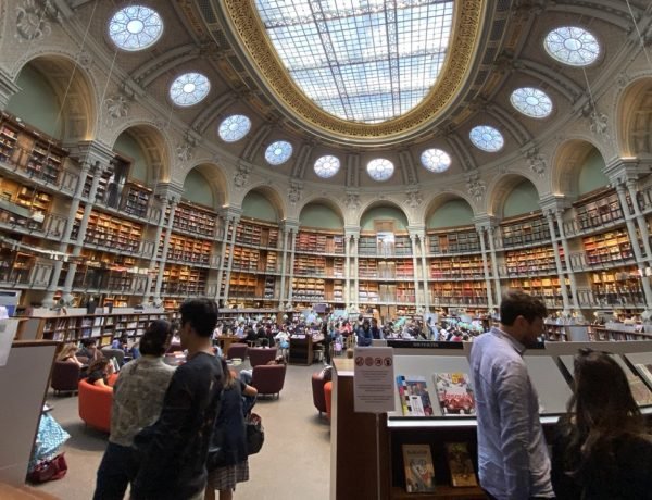 Library reading room in Paris with desks, bookshelves, french books
