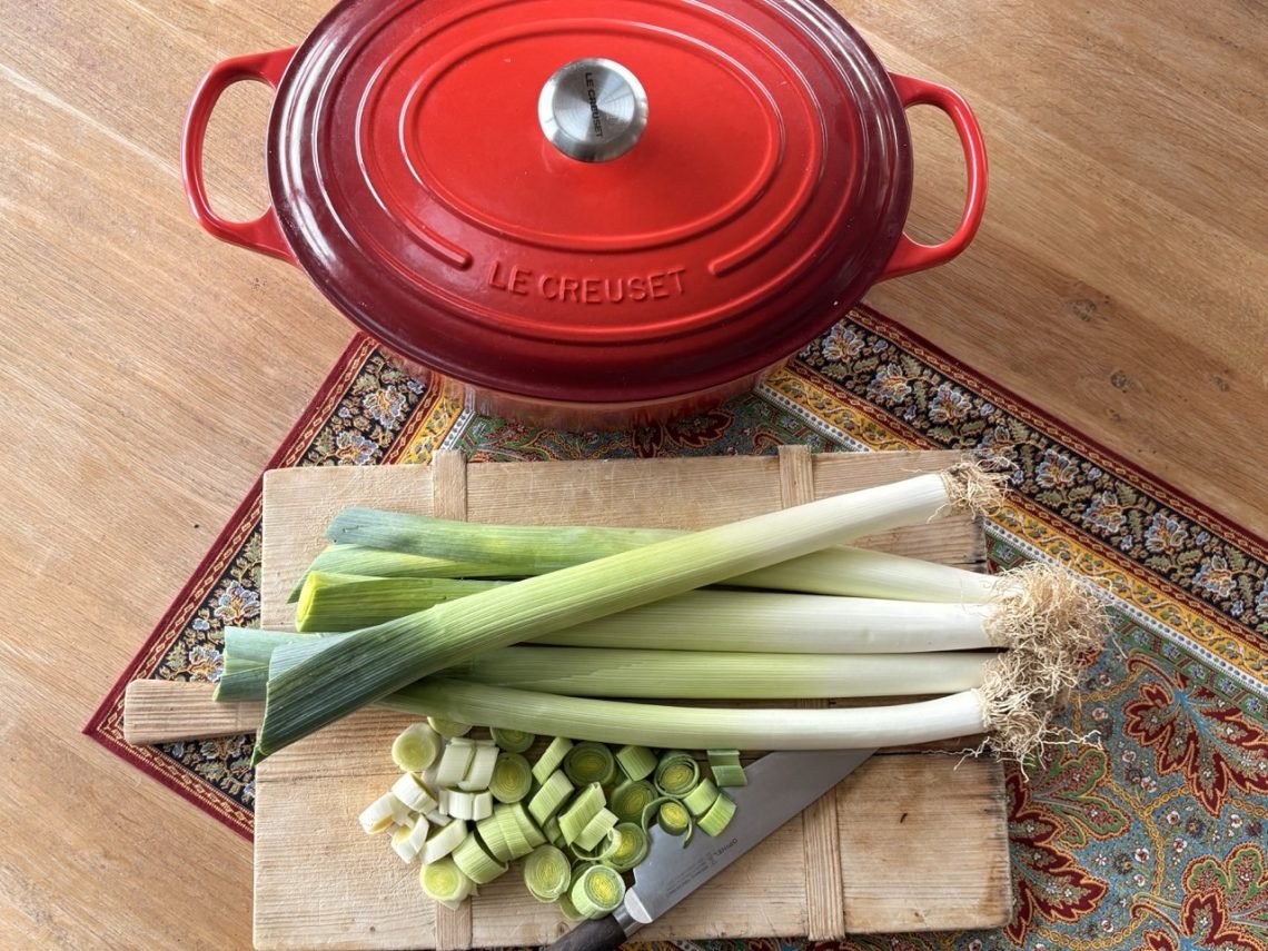 French leek soup for weight loss ingredients on a wooden chopping board