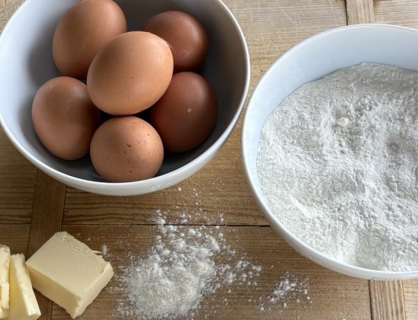 SImple baking ingredients: eggs, flour, butter, whisk for cooking with children