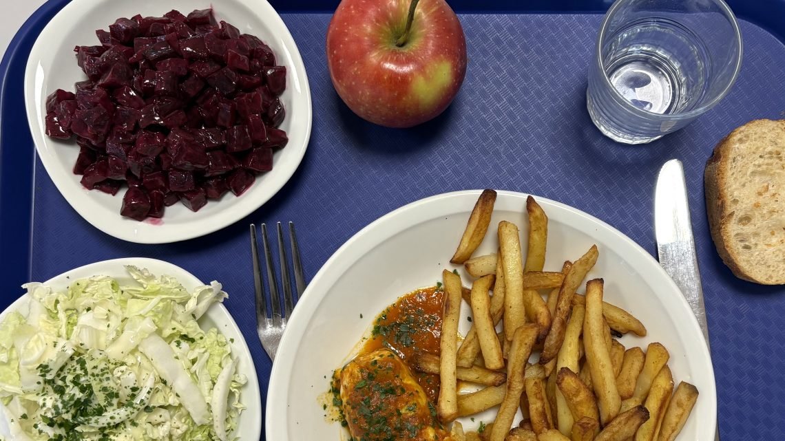 French school lunch tray that includes beet salad